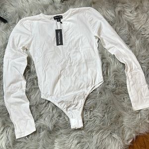 Pretty Little Things White Long Sleeve Body Suit